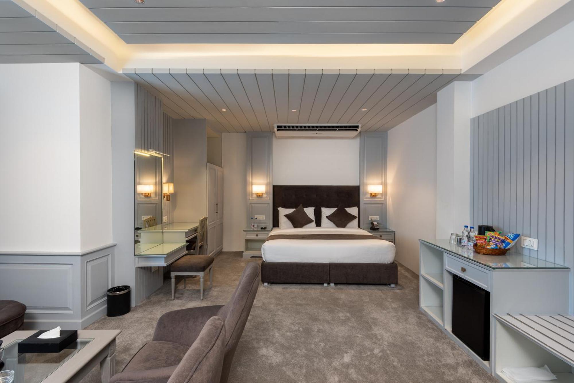 Hotel Grand Boulevard Durgjan Bilik gambar