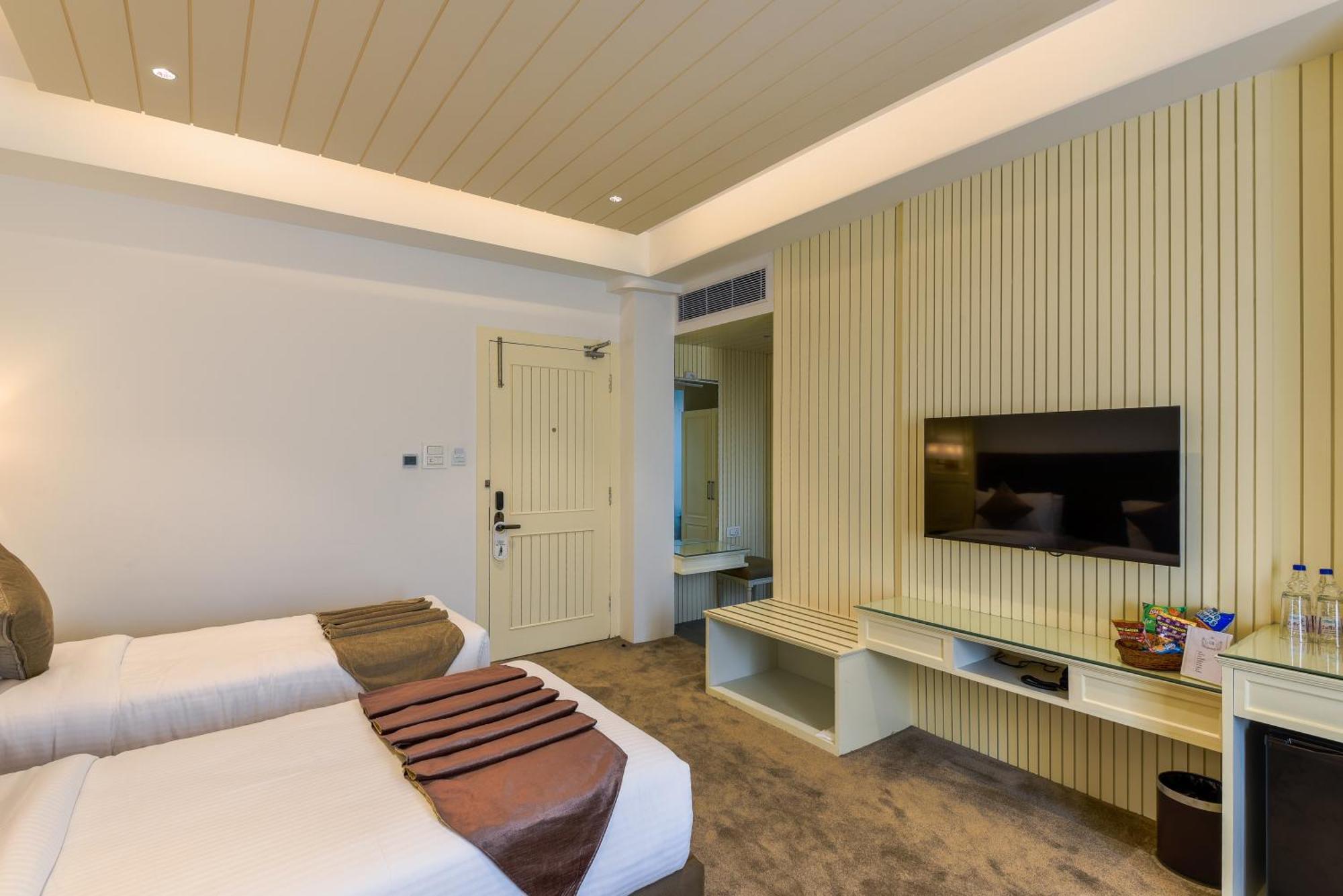 Hotel Grand Boulevard Durgjan Bilik gambar