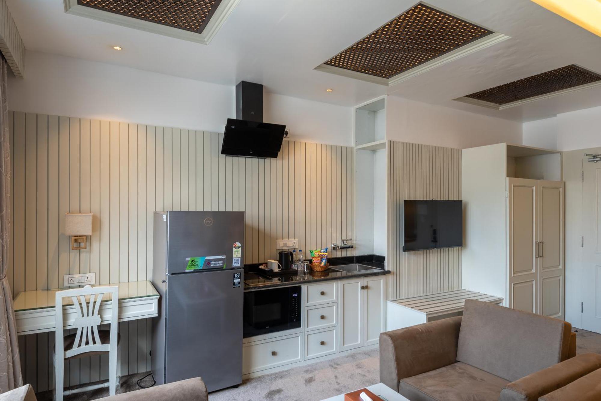 Hotel Grand Boulevard Durgjan Bilik gambar